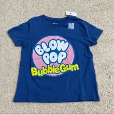 Old Navy Gender-Neutral Licensed Pol Culture Graphic T-Shirt New With Tags Details In The Pix From Kids Pets N Smoke Free House Playful Blue Graphic Print Top, Playful Blue Shirt With Cartoon Print, Playful Blue Cotton Top, Cute Blue Short Sleeve Shirt, Blue Cotton Top With Cartoon Print, Playful Blue Crew Neck Shirt, Playful Blue Short Sleeve T-shirt, Blue Short Sleeve Shirt With Cartoon Print, Fun Blue Shirt With Letter Print