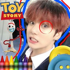 an image of a boy with toy story on his face and crayons around him