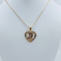 ❤️ 14k gold necklace heart sweet 15 pendant  ❤️ Quinceañera Pendant is approx 17mm  ❤️ Multi-tone gold necklace 20" long 2mm ❤️ 14k gold Sweet 15 heart pendant white cubic zirconia  ❤️ New fine jewelry  ❤️ Pendant is yellow gold with rose gold   Checkout my other jewelry  ❤️ Dije y cadena colgante de oro de 14 Kilates  ❤️ Corazon de quinceañera de mujer de 17 milímetros  ❤️ cadena de 3 oros mide 20 pulgadas de larga  ❤️ Dije Oro dorado 14 Kilates y con oro rosado con piedra blanca zirconia  ❤️ Incluye cajita SKU 6283 Personalized Gold Jewelry For Special Day, Personalized Gold Necklaces For Special Day, Personalized Gold Necklace For Special Day, Gold Heart Charm Necklace For Birthday, Gold Heart Necklace With Hallmark For Birthday, Gold Necklace With Heart Charm For Birthday, Gold Necklaces For Valentine's Day, Personalized Yellow Gold Jewelry For Sweet 16, Gold Necklace For Mother's Day