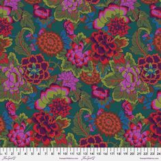 an image of a flowery fabric with purple, red and green flowers on it