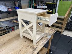 an unfinished table being built in a shop