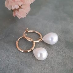 14k solid yellow gold hoop with AAA teardrops pearls *minimalist chic and modern statement earrings are always up to date *100% 14k solid gold best for sensitive ears * lever back hoops easy to put on * hoop outer diameter 13mm * 1.5mm thick * pearl size 9x11mm approx  * natural fresh water pearls *100% solid gold hallmarked on hoop Minimalist Teardrop Hoop Earrings With Pearl Charm, Minimalist Teardrop Pearl Earrings With Charm, Minimalist Teardrop Pearl Charm Earrings, Minimalist Hoop Pearl Charm Jewelry, Minimalist Hoop Jewelry With Pearl Charm, Everyday 14k Gold Hoop Earrings With Pearl Charm, Formal Teardrop Hoop Earrings With Pearl Charm, Minimalist Hypoallergenic Teardrop Pearl Earrings, 14k Gold-filled Minimalist Teardrop Huggie Earrings