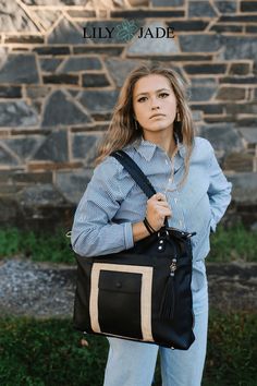 The Marie Bag in Black & Gold - The unique front design is a showstopper! The organization on the inside truly anchors the bag as the “must-have tote” for all seasons of life. It includes one full-size zipper pocket, two interior drink pockets (including one insulated), and two large slip pockets. The Marie is crafted with our luxurious vegan leather with Lily Jade quality enhanced durability. Vegan Leather Bag, Seasons Of Life, Day Bag, Perfect Bag