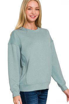 Experience ultimate comfort and style with the Zenana Scuba Round Neck Sweatshirt. Made from high-quality scuba fabric, this sweatshirt offers a soft and stretchy fit. With a classic round neck design, it is perfect for everyday wear and can be dressed up or down for any occasion. Upgrade your wardrobe with this must-have piece. Details:- Soft Scuba Fabric- Stretchy- Side Accent Seam Lines- Comfortable Loungewear Fabric Content:- 90% Polyester, 6% Rayon, 4% Spandex Comfortable Loungewear, Round Neck Design, Scuba Fabric, Round Neck Sweatshirts, Bottom Clothes, Vintage Accessories, Mix Match, Neck Designs, First Look