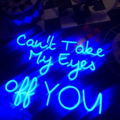 a neon sign that says, could't take my eyes off you