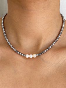 THE EMENDO SILVER HEMATITE PEARL NECKLACE – Rimor Jewelry Pearl Chain Necklace, Hematite Beads, White Freshwater Pearl, Pearl Chain, Steel Chain, Stainless Steel Chain, Chain Lengths, Freshwater Pearls, Diamond Cuts