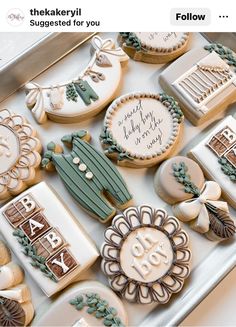 some cookies that are sitting on a table with the words happy birthday written on them