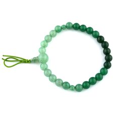 Indian Jade Gradation Japanese Juzu Bracelet Characteristics of the product Material : Green Aventurine (Indian Jade), Silk elastic cord Diameter : about 53mm (2.086in). It fits a 16cm wrist. We adjust the size to your wrist for a fee. Head beads : about 10mm (0.393in) Main beads : about 7mm (0.275in) Handmade in Kyoto, JAPAN There are 2 types, bracelet and juzu. About Jade Jade is the stone representing calm amid a storm. It's said to balance nerves and soothe cardiac rhythm. A piece of Jade ke Adjustable Aventurine Beaded Bracelets For Spiritual Use, Adjustable Spiritual Aventurine Beaded Bracelets, Adjustable Aventurine Bracelets With 8mm Beads, Adjustable 8mm Aventurine Beaded Bracelets, Adjustable Aventurine 8mm Beads Bracelet, Green Hand-strung Bracelet For Meditation, Adjustable Hand-strung Aventurine Beaded Bracelets, Cardiac Rhythms, Hand-strung Turquoise Jade Bracelets