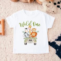 a t - shirt that says wild one with animals on it