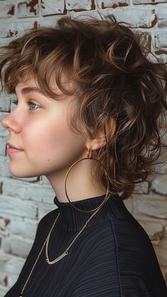 Show Off Your Style: 30 Flattering Short Hairstyles for Round Faces Curly Hair Lesbian Hairstyles, Short Edgy Curly Hair, Curly Cool Hairstyles, Wavy Queer Haircut, Underlayer Hair Dye Short Hair, Bob Cut For Curly Hair Round Faces, Short Curly Hair Shag Haircut, Short Shag Hairstyles Thick Hair, Curly Mullet Round Face