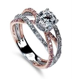 two tone gold and silver wedding ring set with pink and white diamonds on the band