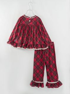 This Red Plaid Ribbon Ruffle Girl Outfit Pajamas is the perfect gift for your girl this Christmas! Featuring a stylish plaid pattern and festive ribbon ruffles, she's sure to look and feel extra special on the big day! 95% Polyester, 5% Spandex The 'milk silk' feel of the material is a blend of Cotton/Polyester/spandex. The pattern is referred to as "milk silk" a super soft, comfortable, buttery feel material- you will fall in love! Care instructions: Cold wash, gentle cycle, hang dry or tumble Outfit Pajamas, Girls Boutique Dresses, Christmas Pajamas Kids, Childrens Clothing Boutique, Plaid Ribbon, Plaid Pajamas, Girls Boutique, Wholesale Dress, Milk Silk