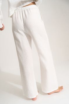 Effortless yet elevated, the 100% linen Drawstring Pant doesn't just lounge like a pro but travels like one, too. From the airplane to the pool, the hammock or the couch, these easy pull-on pants make everything a breeze. Relaxed Fit Pants For Summer Lounging, Relaxed Fit Pants For Lounging In Summer, Comfortable Wide Leg Pants For Summer Lounging, Comfortable Wide Leg Pants For Lounging In Summer, Spring Linen Lounging Pants, Linen Bottoms With Elastic Waistband For Lounging, Casual Linen Lounging Bottoms, Versatile Linen Wide Leg Beach Pants, Comfortable Wide Leg Pants For Vacation