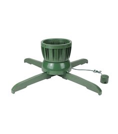 a green plastic flower pot sitting on top of a metal stand with an electric cord attached to it