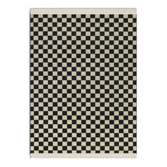 a black and white rug with checkered design