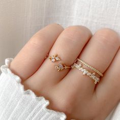 Fine Jewelry Crystal Open Ring With Sparkling Stones, Crystal Open Ring With Sparkling Stones For Promise, Sparkling Stones Open Ring For Promise, Sparkling Stones Open Crystal Ring For Promise, Sparkling Crystal Open Ring For Promises, Dainty Jewelry With Sparkling Stones For Promise Ring, Delicate Pink Stackable Rings For Gifts, Dainty Pink Diamond Ring, Sparkling Open Diamond Ring Gift