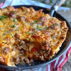 a close up of a pie on a plate