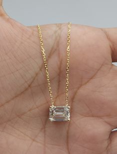 This is a beautiful Lab Grown diamond design pendant. It is set in real solid 14Kt Gold and the chain is 14Kt Gold as well.  You can choose if you want 14Kt White Gold, 14Kt Yellow Gold or 14Kt Rose Gold.  We have a lot of beautiful jewelry with natural diamonds. If any listing states "diamond" then it is a natural diamond. If the listing states "Lab Grown" it is a Lab Grown diamond. The chain is attached at the top so that the diamond sits comfortably on you when you wear it. This is the perfec Emerald Cut Yellow Gold Diamond Necklace Gift, Emerald Cut 14k White Gold Diamond Necklace, 14k Gold Diamond Necklace With Brilliant Emerald Cut, 14k Gold Necklace With Emerald Cut Diamond Accents, White Diamond Cut Necklace, 14k Gold Diamond Necklace With Brilliant And Baguette Cut, 14k Gold Diamond White Baguette Cut Diamond Necklace, 14k Gold Baguette Cut Diamond Necklace With Brilliant Details, 14k Gold Diamond Necklace With Baguette Cut