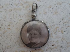 Antique French silver ( MARKED ) photo holder locket medal medallion photo locket pendant of French lady and man, The shrine can be opened. So it is possible to place photos of for example your children or others. Measures: 0,93 x 1,27 inches ( 2,37 x 3,24 cm ) I bought locket on a brocante ( fleamarket ) in France. If you don't have paypal, you can pay by bank transfer. Registered shipping is possible. If you have questions you always can contact me. Watch also my other religious items. Registe Antique Silver Locket Necklace With Charms, Silver Antique Locket Necklace With Charms, Memorial Medallion Locket Necklace With Charms, Silver Amulet Locket Necklace With Round Pendant, French Lady, Z Photo, Catholic Medals, Photo Holder, Photo Locket