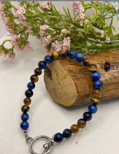 Tiger Eye energy healing Bracelet with sterling silver clasp. Blue Tiger Eye Bracelet, Blue Tiger Eye, Malachite Bracelet, Bracelets Women, Special Occasion Jewelry, Lava Bracelet, Blue Tiger, Tiger Eye Bracelet, Blue Tigers Eye