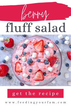 berry fluff salad in a bowl with marshmallows and strawberries on top