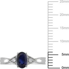 an oval shaped blue sapphire and diamond ring with measurements for the size, width and weight