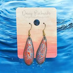 these teardrop earrings I designed, cut out the pattern from sheet copper, then I apply the multiple applications of the colors of enamel and then fire in my kiln at over 1400 degrees after each application to get the desired effect, these would be great 4th of July earrings! or any other U S patriotic holiday, sterling ear wires, boho chic stye Handmade Orange Teardrop Earrings, Nickel-free Teardrop Artsy Earrings, Artistic Teardrop Soldered Earrings, Unique Hypoallergenic Teardrop Earrings, Usa Earrings, 4th Of July Earrings, Earrings Boho Chic, Fused Glass Earrings, Boho Chic Earrings