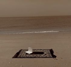 a square object is placed on the beach