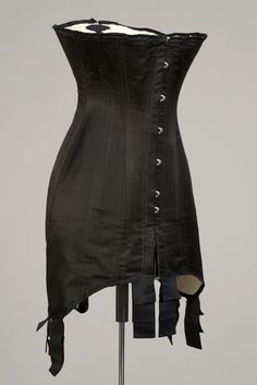 Corset. American, ca. 1910. Black silk with steel boning. Gift of Warnaco, Inc., KSUM 1983.1.117b Girdles, Leather Corset, Vintage Mode, Edwardian Era, Edwardian Fashion