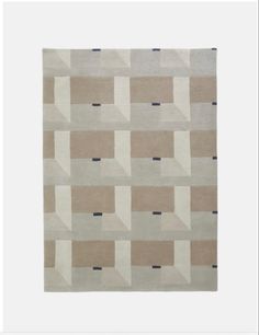 a beige rug with squares and rectangles on it