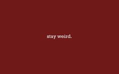 the words stay weird written in white on a red background