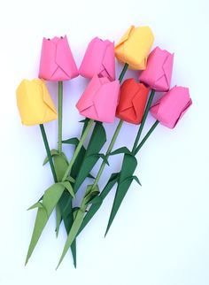 origami flowers are arranged on top of each other