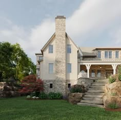 a large house with stone steps leading up to it