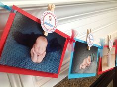 a baby's first year photo hanging on the wall with clothes pins attached to it