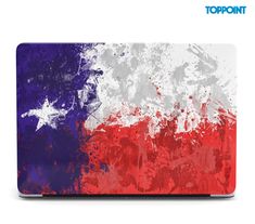 the texas flag painted on top of an apple laptop computer with paint splatters all over it