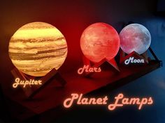 three solar system lamps with the names planets on them