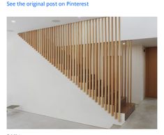 the stairs are made out of wood and have been designed to look like wooden slats