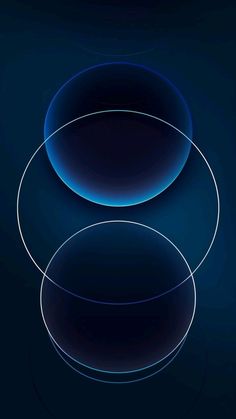 two circles that are connected to each other on a dark background with blue lines in the middle