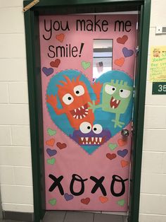 a door decorated with two cartoon characters and the words you make me smile on it