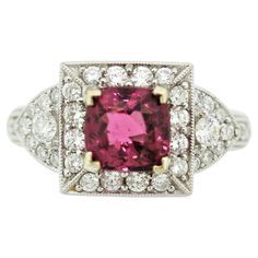 A classic ring featuring a fine spinel weighing 1.70 carats. It has a slighting pinkish-red color that is vivid, bright, and full of life. It is complemented by 1.30 carats of round brilliant-cut diamonds set all around the ring. Made in 18k white gold, spinel is an underappreciated fine gemstone from antiquity. Ring Size 6 Diamond Gold Ring, Contemporary Engagement Rings, Spinel Ring, Pink Spinel, Spinel Gemstone, Pinkish Red, 18k Gold Earrings, Diamond Cocktail Rings, Diamond Gold