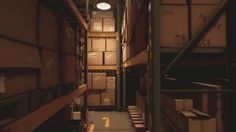 an empty warehouse filled with lots of boxes next to a metal shelf and light fixture