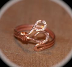 An adjustable heart copper ring for the middle of your fingers or your little toes. Each ring is made to order and I make them in the following US ring sizes 3 - 12.75. The most popular knuckle or toe ring size is 3. Shipping is the same no matter how many items you place on your order. Handmade Adjustable Heart Ring For Promises, Small Gauges, Rings Handmade, Copper Ring, Thumb Ring, Toe Ring, Handmade Rings, Copper Rings, Thumb Rings