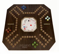 a wooden board game with dices and playing cards