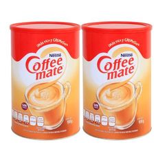 two cans of coffee mate on a white background