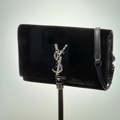 Description Saint Laurent Clutch From The 2019 Collection By Anthony Vaccarello Black Velvet Gunmetal & Tonal Hardware Chain-Link Shoulder Strap Leather, Crystal & Tassel Accents Leather Lining & Dual Interior Pockets With Card Slots Snap Closure At Front Very Good Condition Ysl Mini Wallet On Chain, Yves Saint Laurent Bags, Anthony Vaccarello, Black Velvet, Chain Link, Mini Bag, Tassels, Yves Saint Laurent, Leather Straps