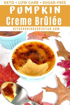 pumpkin creme brulee in a bowl with spoons and leaves around it