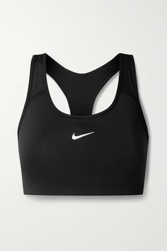 Nike's 'Swoosh' sports bra is ideal for medium-impact workouts, like cycling, hiking and dancing. Cut from moisture-wicking stretch-recycled polyester with Dri-FIT technology, its fitted with removable padding and has a supportive elasticated underband that stays in place. The racer-back straps allow for unrestricted movement. Wear yours with a pair of the label's [leggings id1107540]. Black Nike Sports Bra Outfit, Nike Sports Bra Aesthetic, Nike Womens Clothes, Black Sports Bra Outfit, Nike Clothes Women, Nike Fashion Outfit, Nike Bras, Legging Nike, Nike Wear