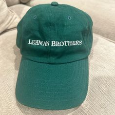 Authentic, Vintage, Barely Worn, Lehman Brothers Dad Baseball Cap. Signature Lehman Brothers Green Coloring And White Font. 100% Authentic - Was Received At Lehman Brothers Event. Great Quality And Has Barely Been Worn. Excellent, Fun, Rare Collectible Gift For Any Finance Bro Or Gal You Know! Classic Green Baseball Cap With Embroidered Logo, Green Classic Baseball Cap With Embroidered Logo, Classic Green Baseball Cap With Flat Brim, Classic Green Flat Brim Baseball Cap, Classic Green Adjustable Baseball Cap, Classic Green Baseball Cap One Size, Classic Green Baseball Cap, Classic Green Hat With Embroidered Logo, Classic Green Hat One Size Fits Most