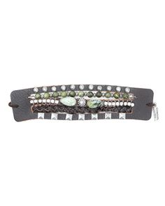 Details: Brown multi-strap leather cuff Each hand-crafted strap is unique with green serpentine and jasper stones, braided leather, rhinestones, and silver studs Pair with our Slow Dance Ring Adjustable tie closure: Fits up to 9.5-inch wrist Nickel free. Read more → Natural stones are unique and may vary in size, color, and shape Dimensions: Length: 5.5-inch Width at center: 1.75-inch Beaded Leather Bracelet For Festivals, Beaded Leather Festival Bracelet, Festival Beaded Leather Bracelet, Adjustable Leather Bracelets With Rivets, Slow Dance, Jasper Stone, Leather Cuffs, Braided Leather, Silver Studs