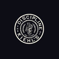 a black and white logo with the words, disciplan atehils on it